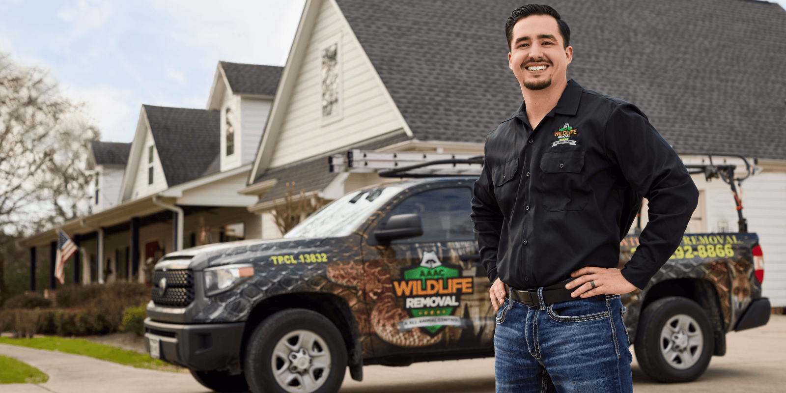 Wildlife removal professional with company truck